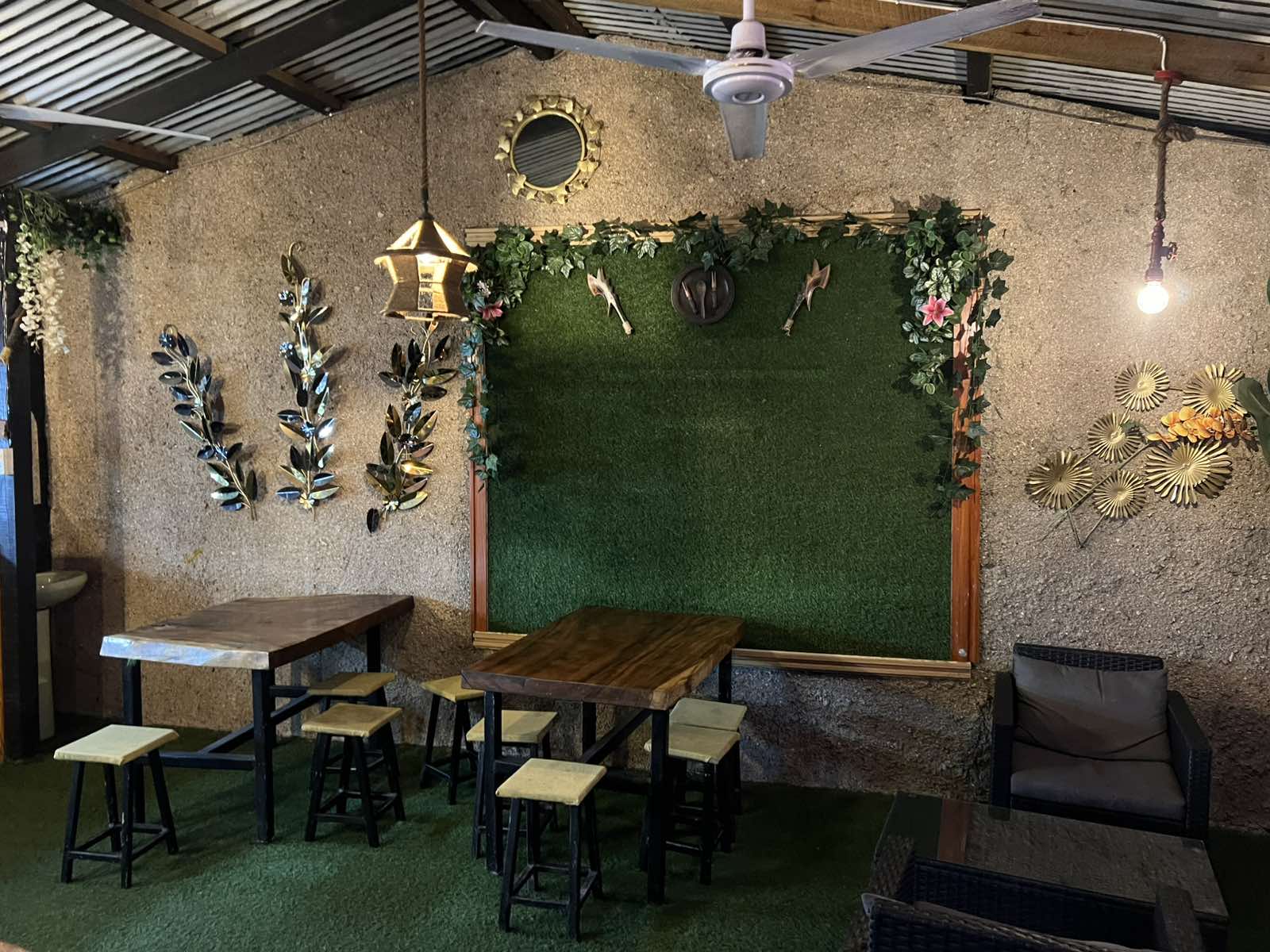 A leafy seating corner at The Island